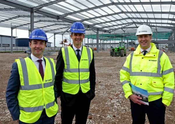 (L-R) Jacques Esterhuizen, Associate Director at CBRE, Mike Baugh, Senior Director at CBRE and Rob Richardson, Development Manager at St. Modwen. The steel framework has been completed on the first phase of development at Parkside Business Park in Doncaster