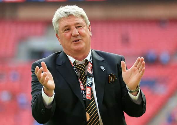 Hull City manager Steve Bruce celebrates winning the Championship Play-Off Final at Wembley