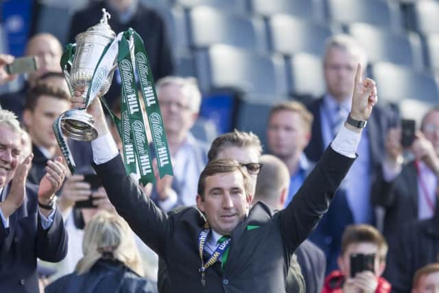 Hibernian manager Alan Stubbs lifts the cup after winning the William Hill Scottish Cup Final, at Hampden Park, Glasgow. He is now the new manager of Rotherham United.