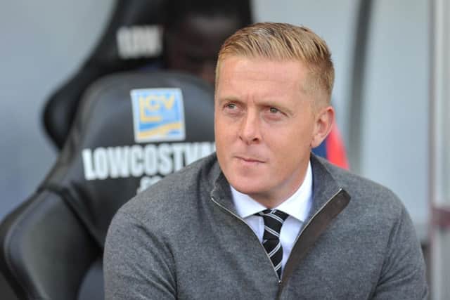 Former Swansea manager Garry Monk appears to be the man Leeds want to replace Steve Evans.