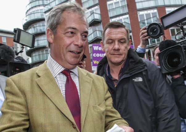 UKIP leader Nigel Farage takes a walk around Leeds Kirkgate market to talk to the public as part of his Leave campaign in the upcoming European referendum.
