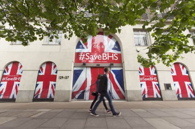 #SaveBHS branding is displayed on the windows of the head office of retailer  British Homes Stores (BHS) in London.