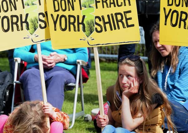 Young demonstrators protest against fracking outside North Yorkshire County Council.