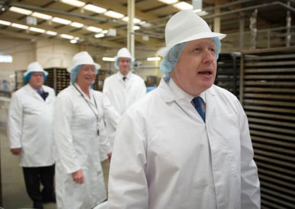 Boris Johnson during a visit to Farmhouse Biscuits in Nelson, Lancashire, where he along with Priti Patel and Michael Gove were campaigning on behalf of the Vote Leave EU referendum campaign.