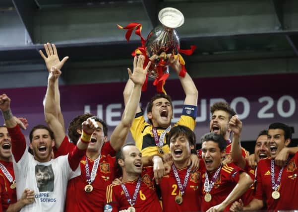 Spain goalkeeper Iker Casillas lifts the trophy after the Euro 2012 final in which they beat Italy 4-0 (Picture: Matthias Schrader/AP).