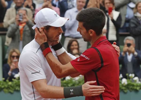 Serbia's Novak Djokovic, right, is congratulated by Britain's Andy Murray after winning the final of the French Open (Picture: Michel Euler/AP).