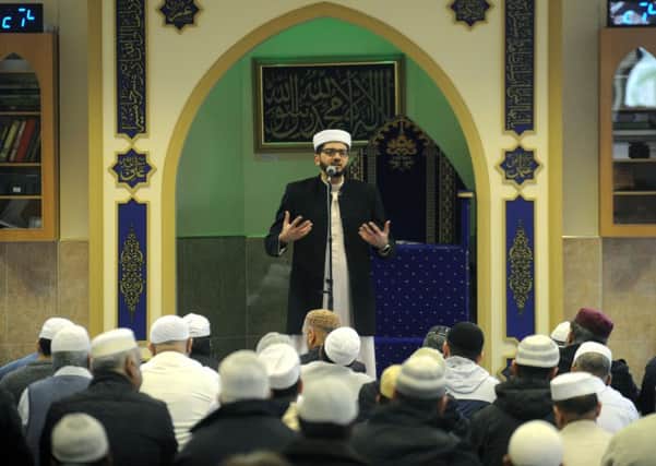 Qari Asim preaches at a mosque in Leeds.