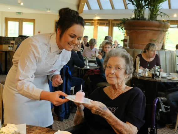 Happy birthday - Former waitress Phyllis Simpson returns to Harrogate's Bettys after 50 years.