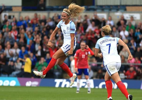 England's Rachel Daly (left) celebrates after scoring her sides third goal of the game during the 2017 UEFA Women's European Championship Qualifying match at Adams Park, Wycombe. (Photo: Nigel French/PA Wire)