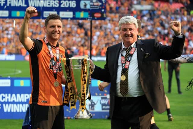 Hull City celebrate winning promotion via the play-offs.