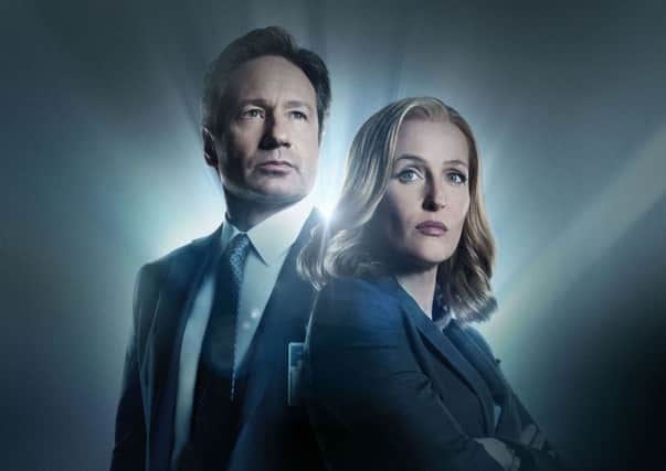 THE TRUTH IS OUT THERE: Agents Fox Mulder and Dana Scully in sci-fi favourite The X-Files.