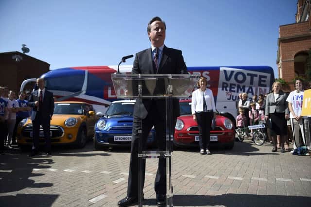 David Cameron, Harriet Harman and Tim Farron stood in front of Minis in their respective party colours to launch the dossier. Green leader Natalie Bennett stood with a green bicycle