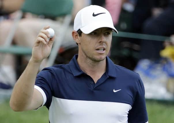 Rory McIlroy acknowledges the crowd on his way to fourth place in the Memorial Tournament (Picture: Darron Cummings/AP).