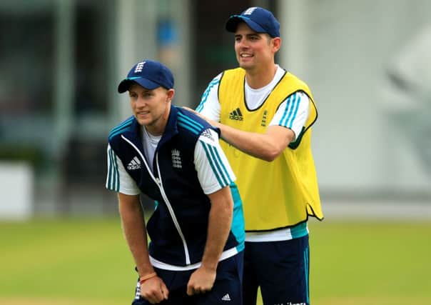 England's Joe Root (left) with captain Alistair Cook at Lord's on Wednesday. Picture: Adam Davy/PA