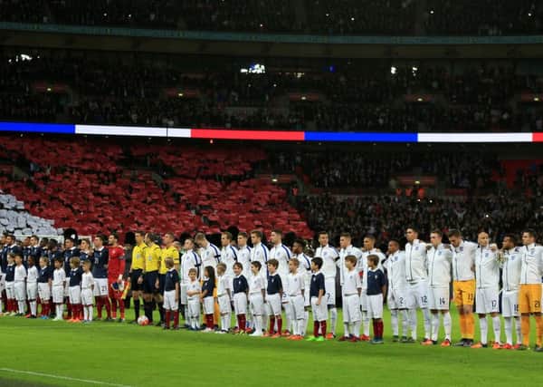 English and French fans sang La Marseillaise in a show of unison and solidarity at Wembley last year. (PA).