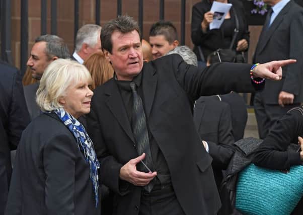 Peter Howitt and Wendy Craig leave Liverpool Cathedral following the funeral of television comedy writer Carla Lane