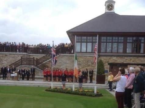 GB&I team Captain Elaine Farquharson-Black and team manager Helen Hewlett raise the flags at the opening ceremony of the Curtis Cup (Picture: Heather Cawdry).