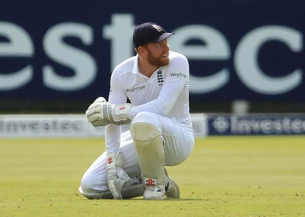 England's Jonny Bairstow gives a rueful smile after dropping a catch during day two of the Third Test with Sri Lanka at Lord's (Picture: Adam Davy/PA Wire).