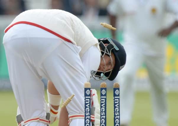 England's Joe Root looks back as he is bowled out by Sri Lanka's Nuwan Pradeep for 4 runs during day three of the Investec Third Test match at Lord's, London. (Picture: Anthony Devlin/PA Wire)