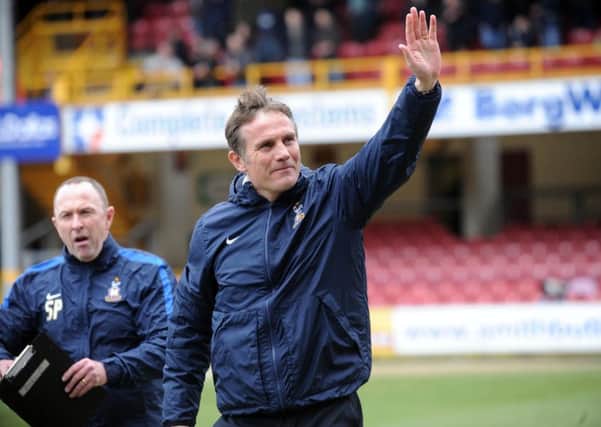 GONE: Phil Parkinson has left Bradford City take over the reins at Bolton Wanderers.