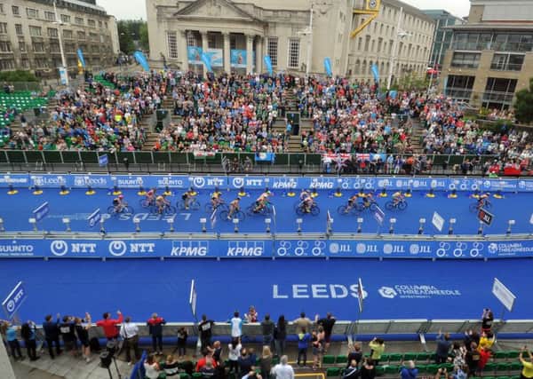 Cyclists pass through the transition area at Millenium Square in the ITU World Triathlon Leeds. Pictures: Tony Johnson.