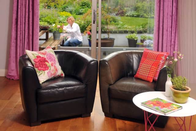 Jo loves colour and bringing the outside in via her patio doors