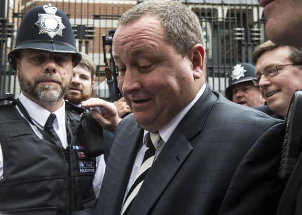 Sports Direct boss Mike Ashley leaves Portcullis House, London, where he gave evidence to the Business, Innovation and Skills Committee on working conditions at his company.