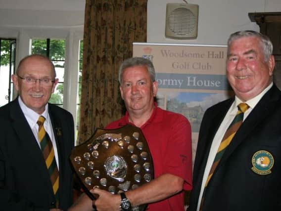 HHDUGC seniors champion Andy Whitworth, centre, with event sponsor Phil Tatlock, left, of Outlane, and the union's president Stuart Naylor.