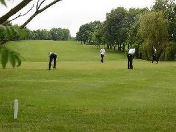 Sheffield's Jordan Perry putts watched by team-mate Mick McGuinness and Leeds's Mark Griffiths and Paul Croft.