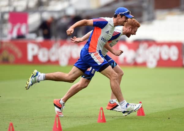 England's Alastair Cook (left) and Jonny Bairstow during a training session. Picture: PA.