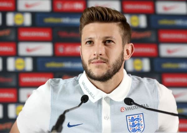 Midfielder Adam Lallana is sure England can cope with the pressure of expectation and defeat Wales tomorrow in Lens (Picture: PA).
