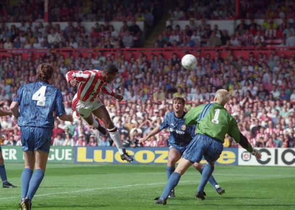 Sheffield United's Brian Deane scores the first ever Premiership goal, versus Manchester United, on August 15, 1992.