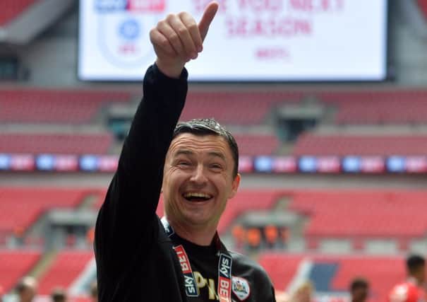 Paul Heckingbottom celebrates after seeing Barnsley promoted to the Championship.  Picture: Tony Johnson.
