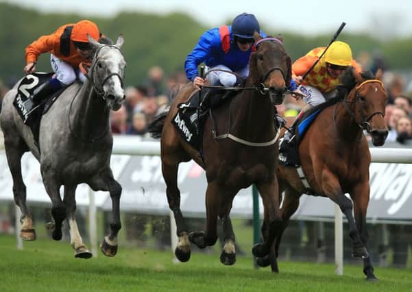 BIG CHANCE: Royal Ascot hope Clever Cookie and PJ McDonald, left, beating Second Step and Andrea Atzeni to land the Yorkshire Cup at the Dante Festival at York. Picture: Mike Egerton/PA