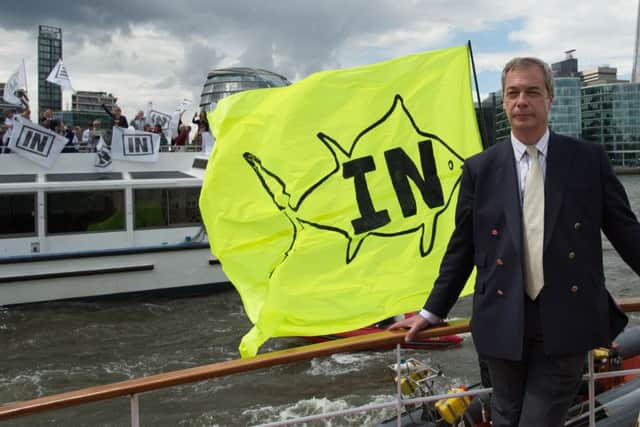 Ukip leader Nigel Farage on board a boat taking part in a Fishing for Leave pro-Brexit "flotilla" on the River Thames