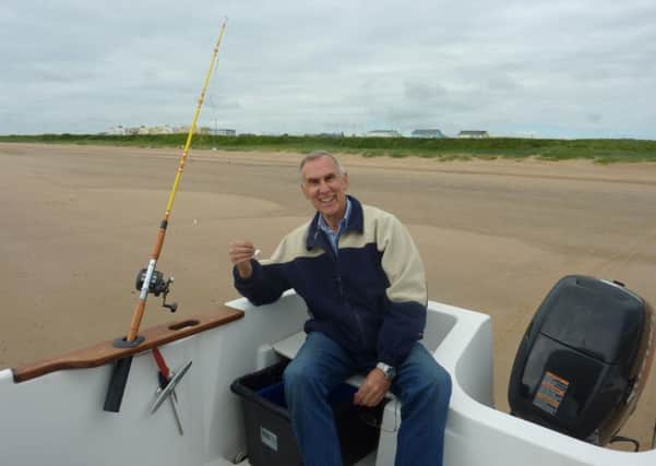 Stewart Calligan gave his fishing boat a through clean as he waits for the weather conditions to take a turn for the better.