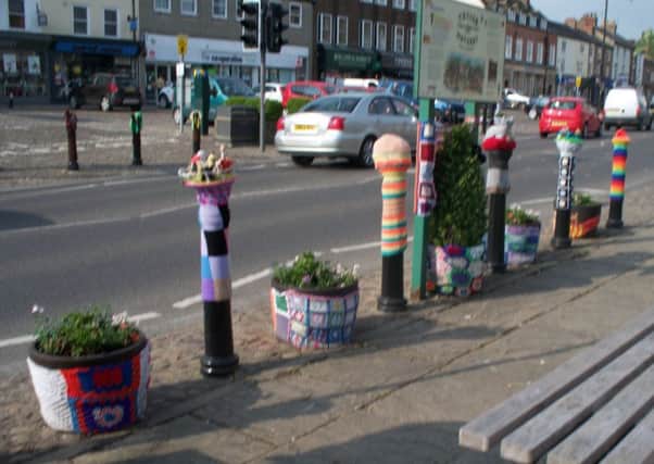 The street furniture of Thirsk have their own clothes, knitted or crocheted.