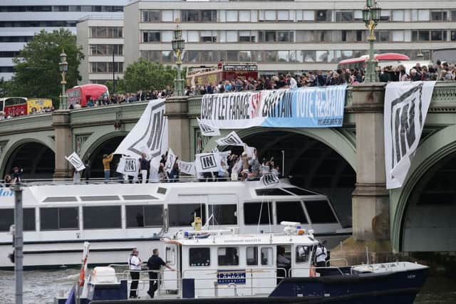 A boat carrying Bob Geldof takes part in a pro-EU counter demonstration, as a Fishing for Leave pro-Brexit "flotilla" makes its way along the River Thames in London. PRESS ASSOCIATION Photo. Picture date: Wednesday June 15, 2016. See PA story POLITICS EU. Photo credit should read: Yui Mok/PA Wire