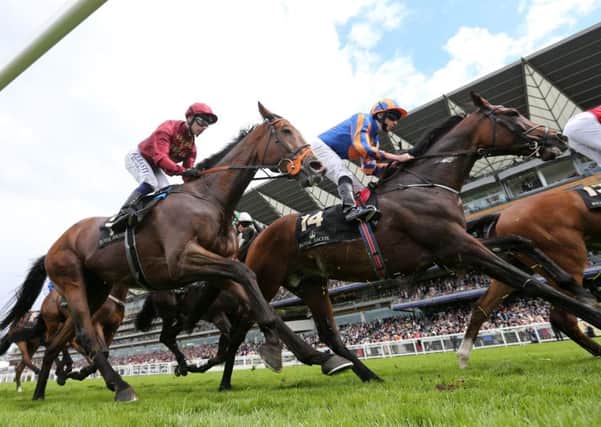 Order Of St George, right, on its way to victory in the Gold Cup In Honour of The Queens 90th Birthday at Royal Ascot (Picture: David Davies/PA Wire).