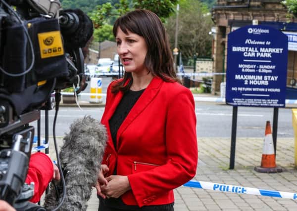 Rachel Reeves, former Shadow Secretary of State for Work and Pensions, talks to the press at the scene in Birstall where local MP Jo Cox was shot and stabbed yesterday after her regular surgery.