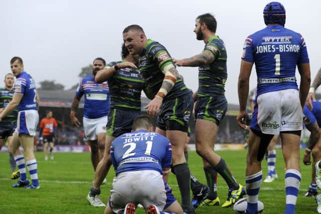 Brad Singleton celebrates his first try against Wakefield.  Picture: Bruce Rollinson