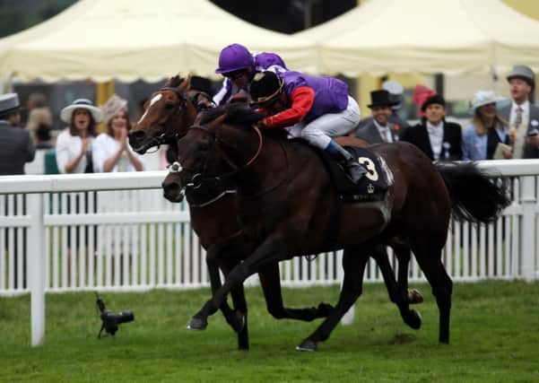 Dartmouth (right) ridden by Olivier Peslier wins the Hardwicke Stakes at Royal Ascot 2016.