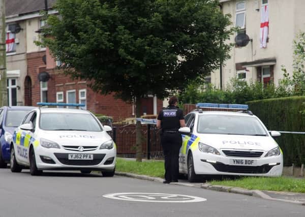 Police at the scene of the murder on Nether Shire Lane, Sheffield. Photo by Glenn Ashley.