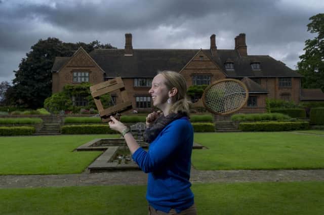 Date: 16th June 2016. Picture James Hardisty.
Goddards House and Garden, Tadcaster Road, York, have reinstated their tennis net on the historic lawn for visitors to enjoy and follow in the footsteps of the Terry family. Pictured Clare Alton-Fletcher head of Goddards, with Tennis memorable belonging to the Terry family.