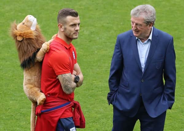 England manager Roy Hodgson speaks to Arsenal midfielder Jack Wilshere during the walk around at the Stade Geoffroy Guichard, Saint-Etienne yesterday (Picture: Owen Humphreys/PA Wire).