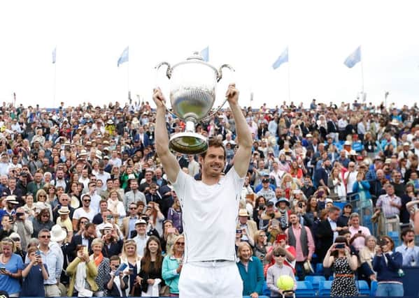 Great Britain's Andy Murray lifts the trophy.