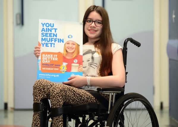 Hannah Hull, who lost the mobility in both her legs after contracting meningitis, has made huge progress since being treated at Sheffield Children's Hospital and is now raising money for the hospital charity. Picture Scott Merrylees