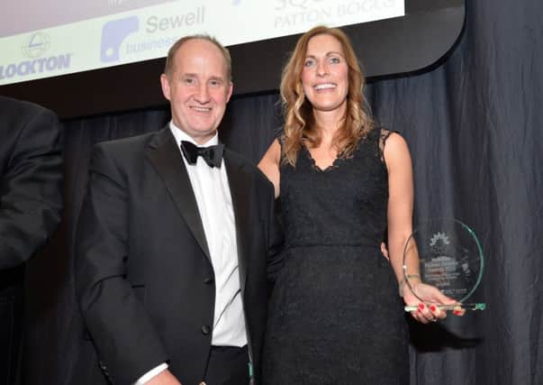 Kevin Hollinrake, MP for Thirsk and Malton, presents the award for Best Finance Director of a Ltd Company (Up to Â£50m) to Jo Cowl of Park Leisure at the Yorkshire Finance Director Awards at Aspire, Leeds. Picture: Anna Gowthorpe