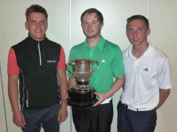 James Gaskell winner of the Ogden Trophy, flanked by Chris Atkins and Nathan Seal.