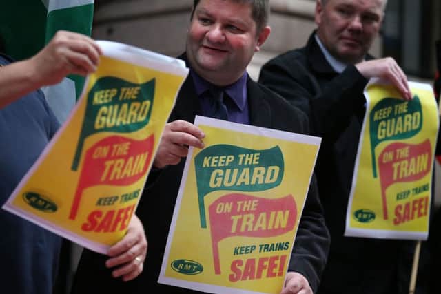 Union officials have staged a demonstration outside ScotRail HQ in Glasgow, as members of the rail union are demanding talks in the Guards dispute.